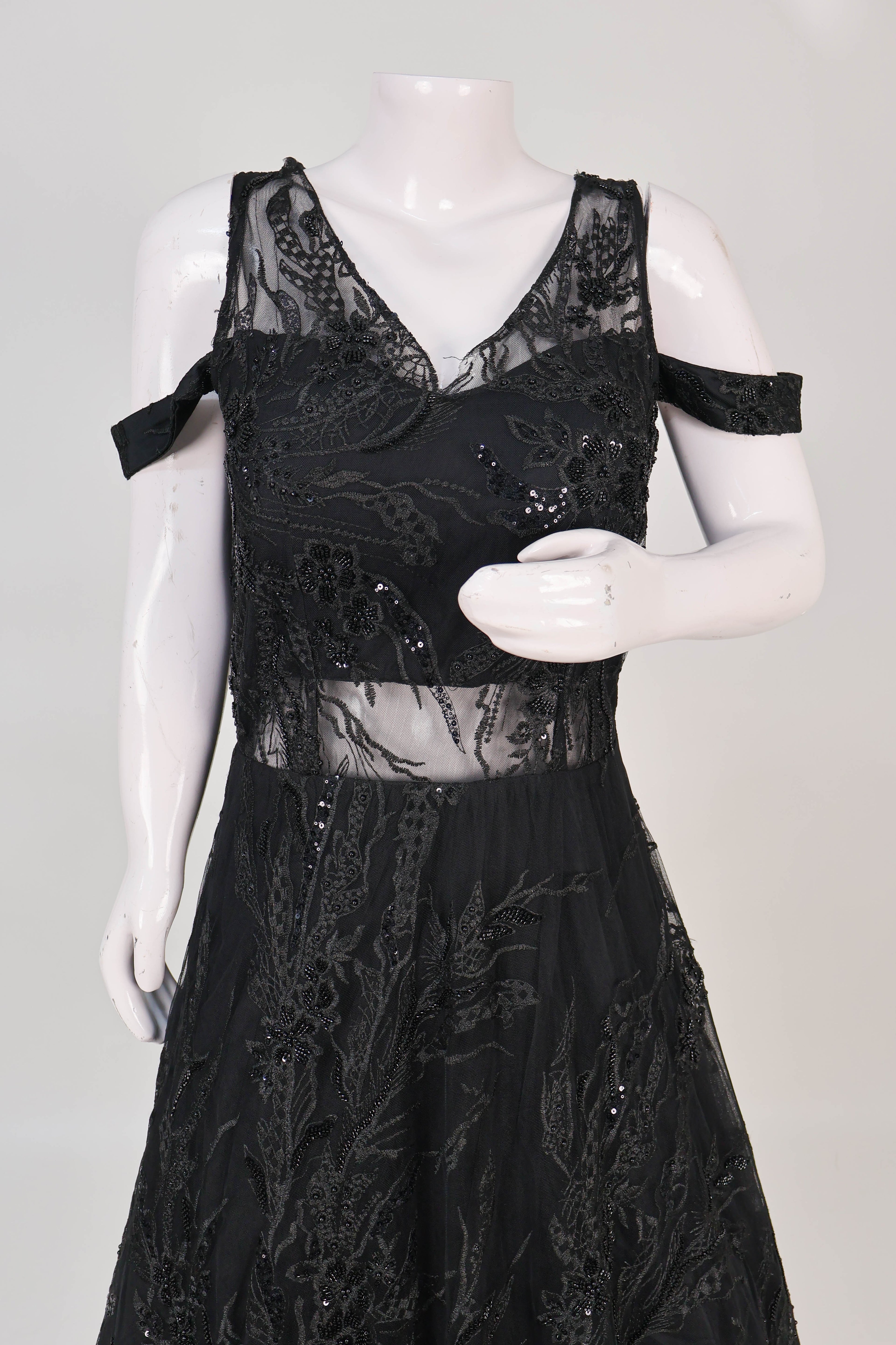 Cold-Shoulder Sequin Ball gown.