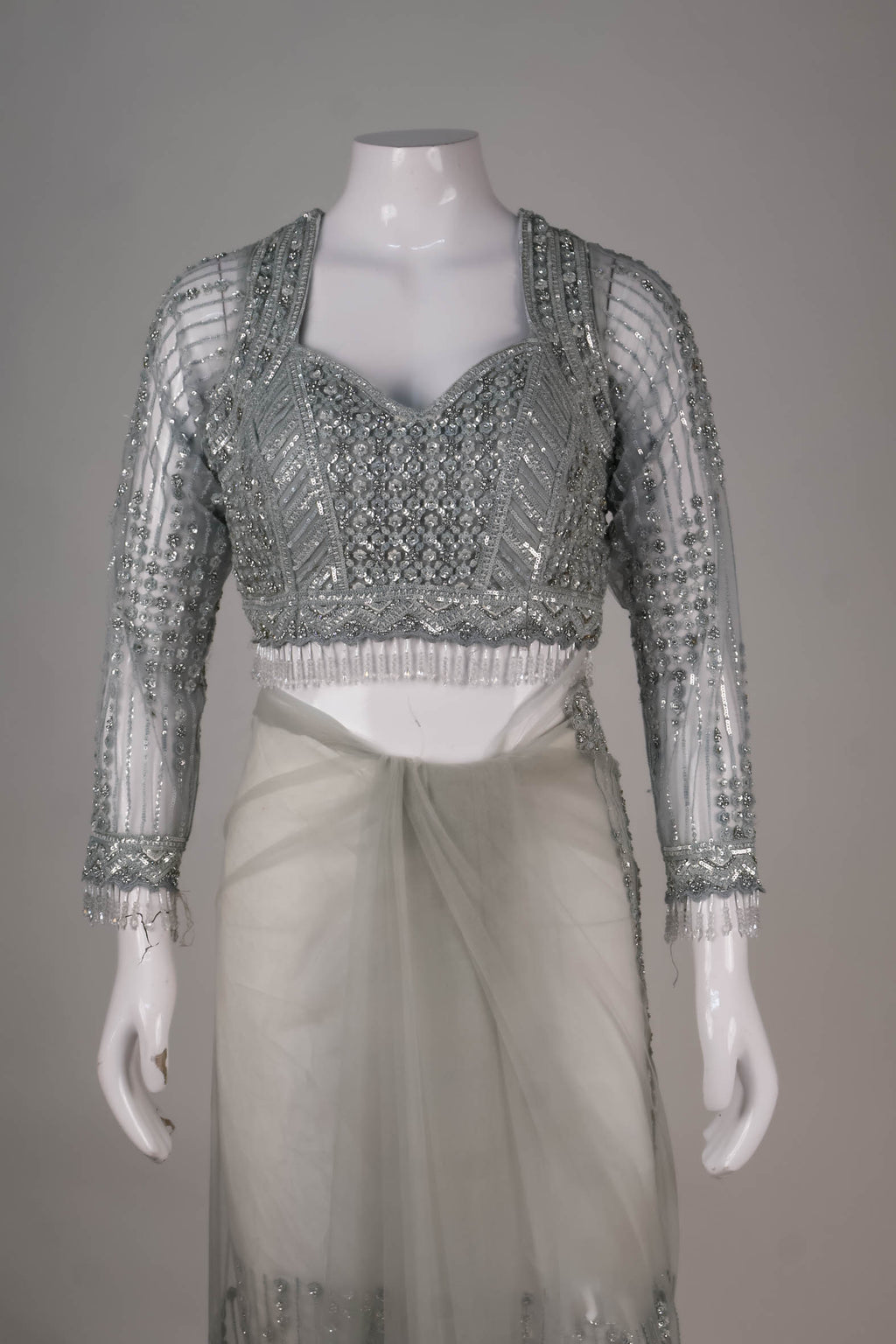 Metallic Silver Net Saree with Intricate Sequin & Crystal Detailing