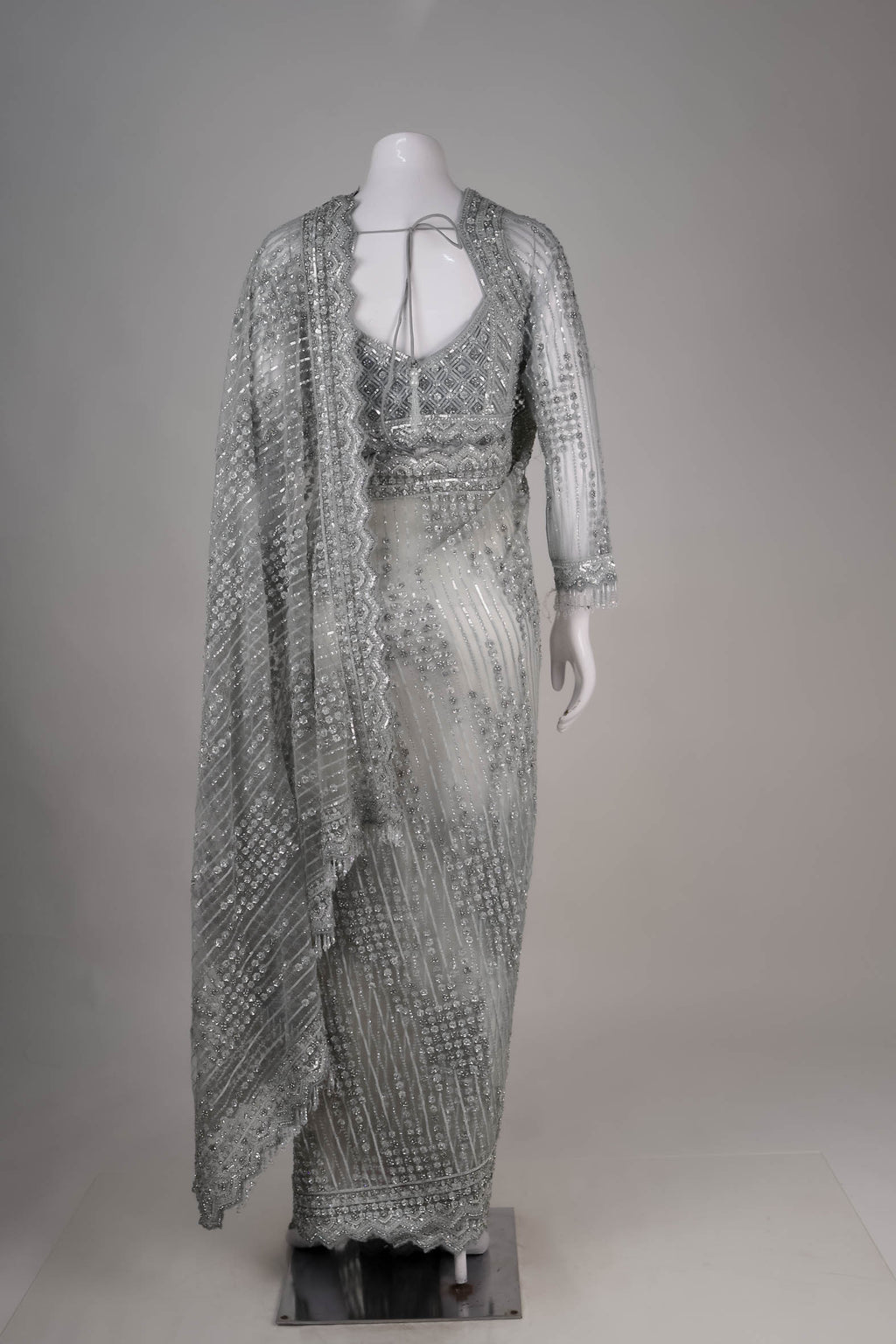 Metallic Silver Net Saree with Intricate Sequin & Crystal Detailing
