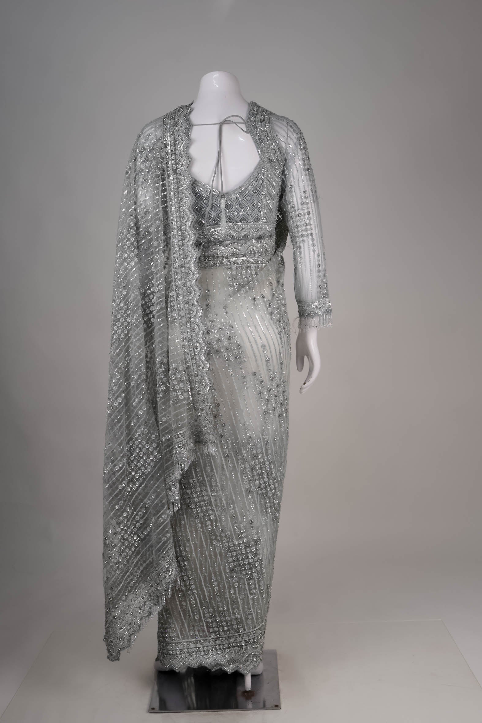 Metallic Silver Net Saree with Intricate Sequin & Crystal Detailing